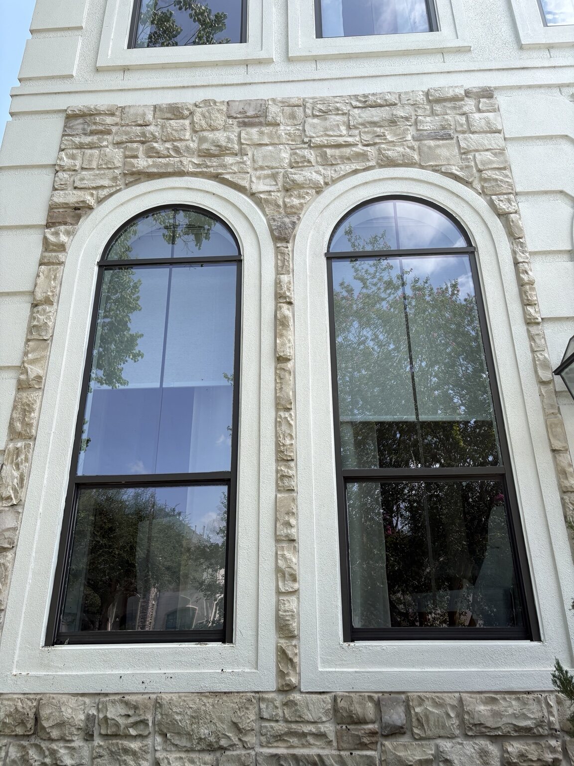 Clean arched windows after professional window cleaning