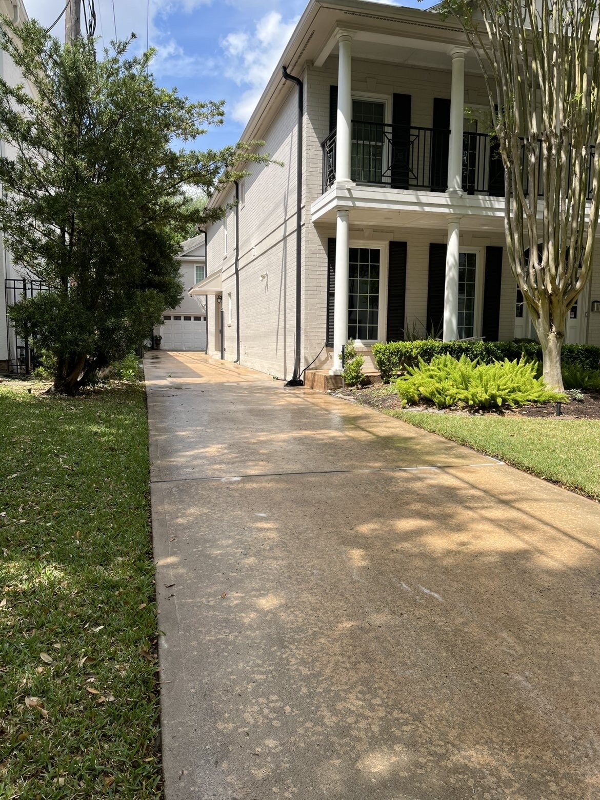 Residential driveway after pressure washing
