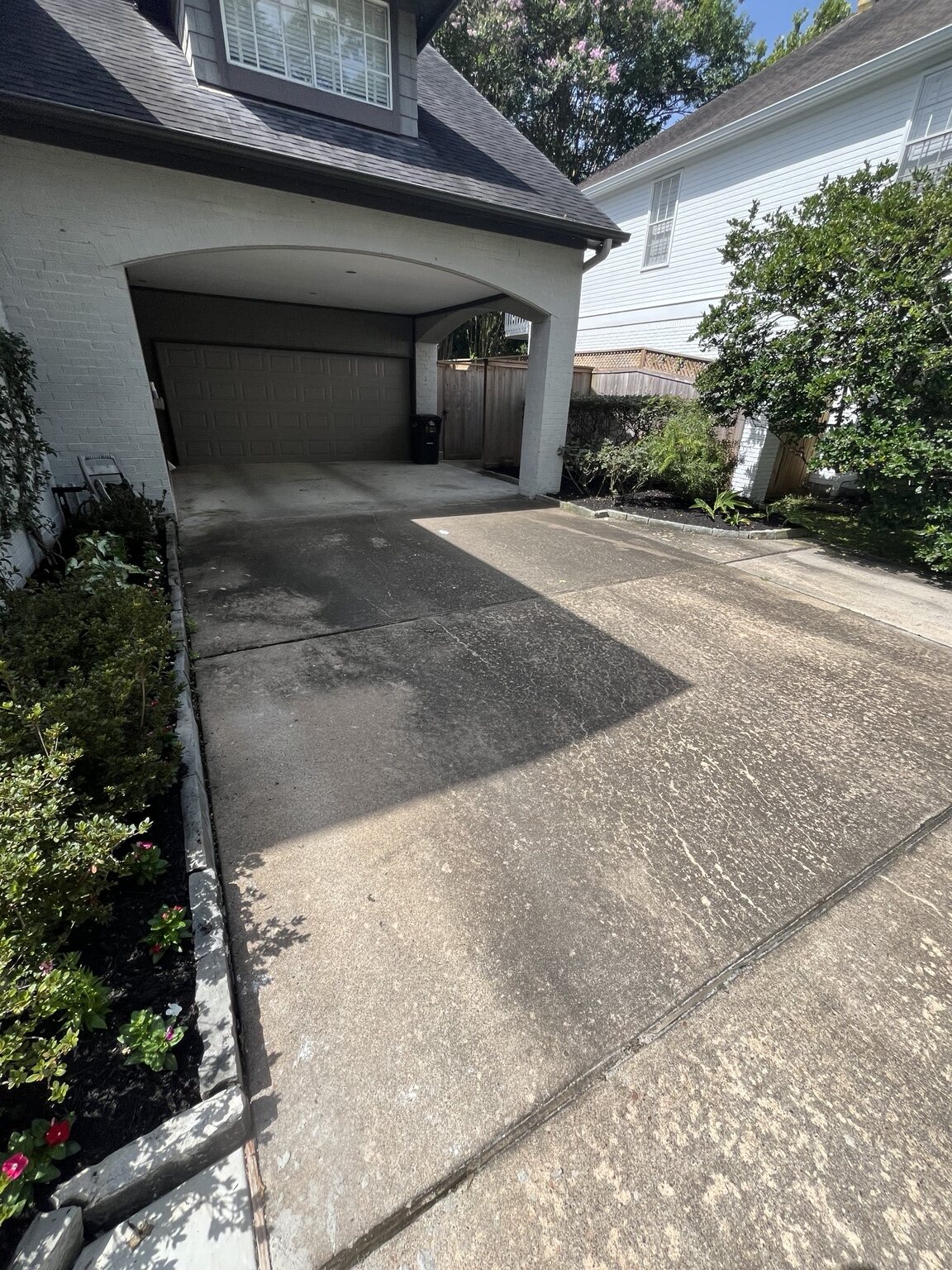 Residential driveway condition before cleaning