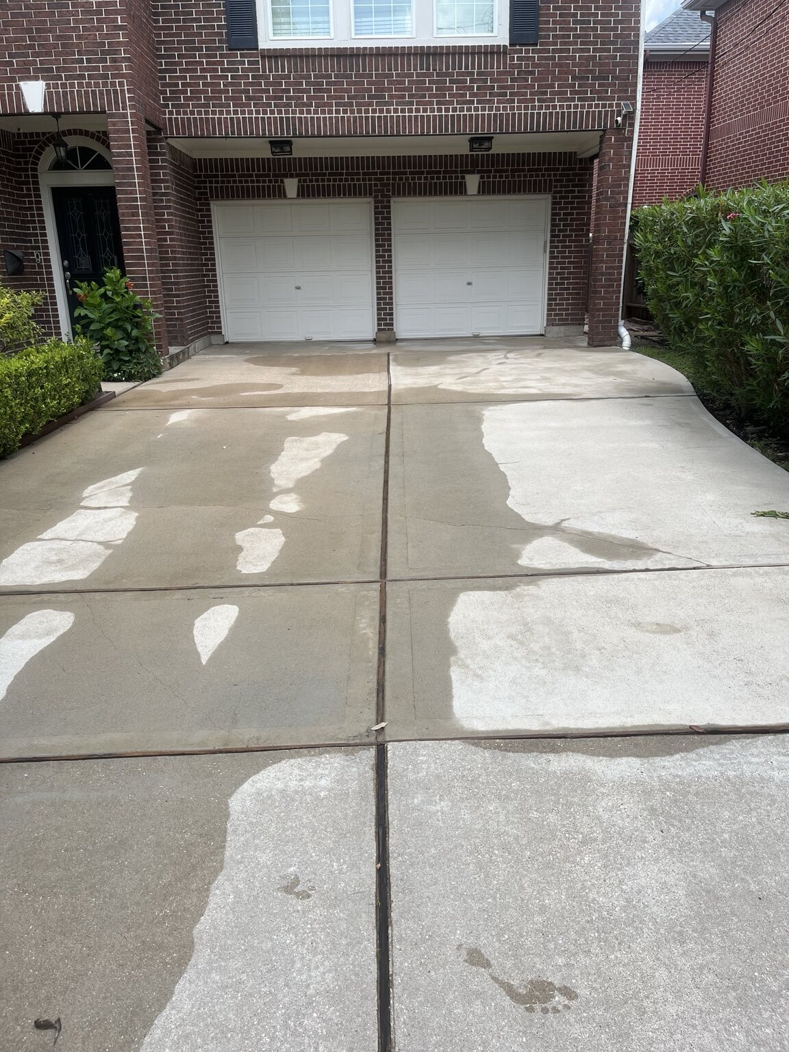 Driveway cleaning treatment in progress