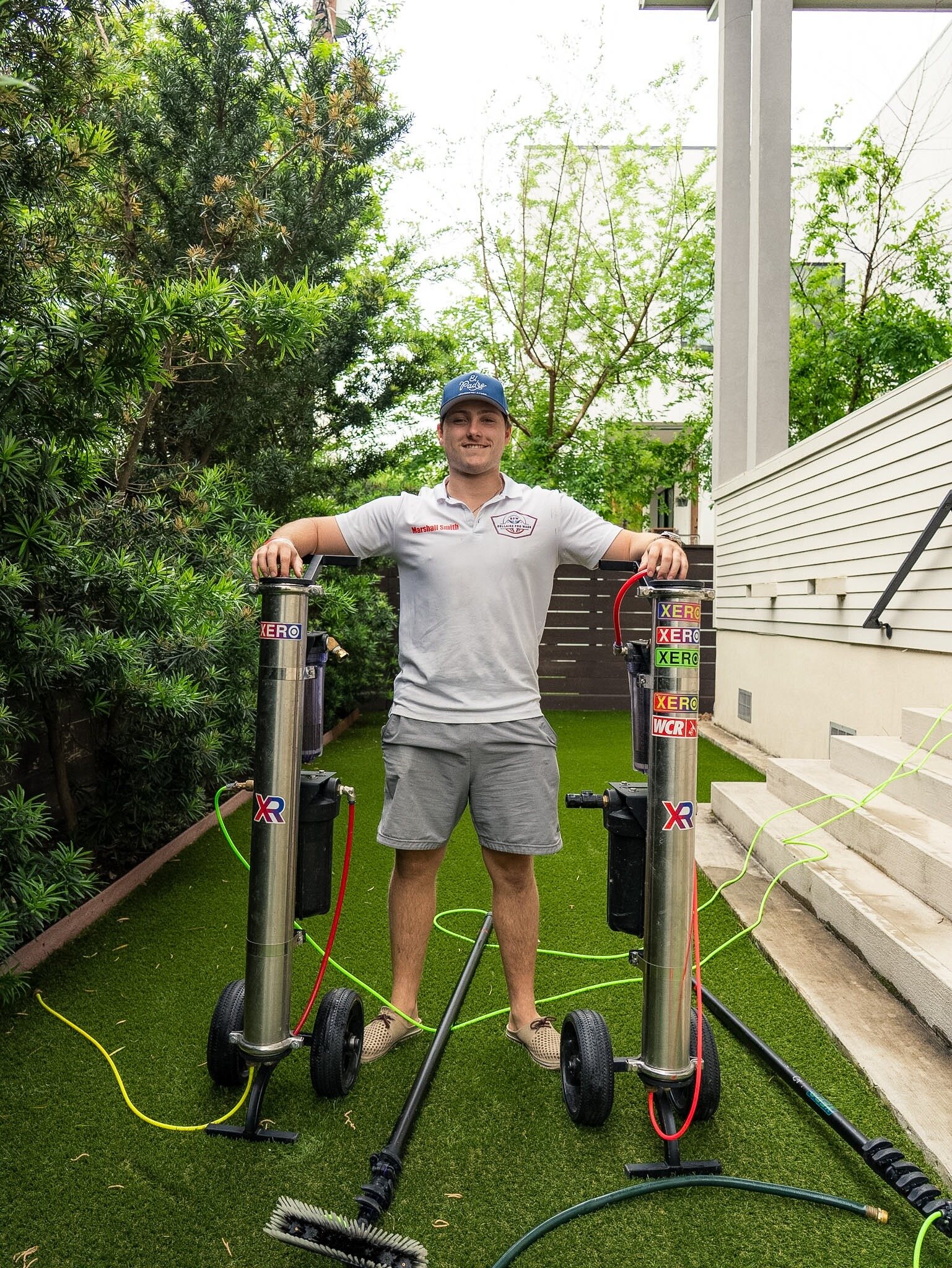 Bellaire Pro Wash technician with professional exterior-cleaning equipment