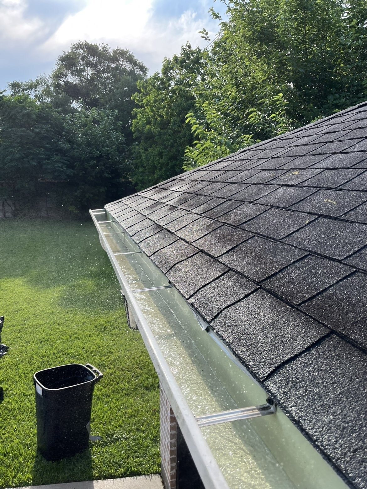 Gutter cleared of debris after cleaning