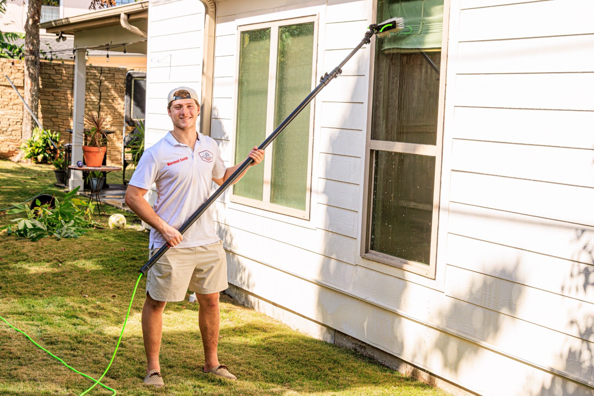 Bellaire Pro Wash technician soft washing residential siding